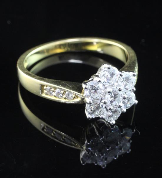 A modern 18ct gold and diamond cluster ring, size N.